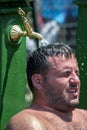 An exhausted competitor at the Kirkpinar Turkish Oil Wrestling Festival in Edirne in Turkey Royalty Free Stock Photo