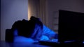 Exhausted doctor sleeping in front working laptop, tiring night shift in clinic Royalty Free Stock Photo