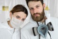 Exhausted doctors or nurses taking of protective mask uniform. Workers with tears in his eyes.