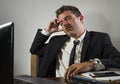 Exhausted financial executive man suffering stress - corporate business lifestyle portrait of stressed and tired businessman Royalty Free Stock Photo