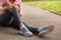 Exhausted jogger woman in the park