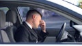 Exhausted male in formal suit sitting on driver seat, stressful life, overwork