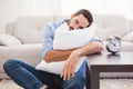 Exhausted man sleeping with head resting on pillow Royalty Free Stock Photo