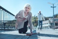 Exhausted older woman falling down with heart attack Royalty Free Stock Photo