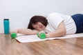 Exhausted Overweight Woman Lying on the Floor