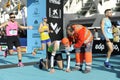 Exhausted runner at the finish line of the Valencia 2019 marathon