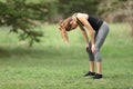 Exhausted runner resting in a park