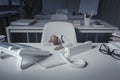 Exhausted small businessman sleeping at desk Royalty Free Stock Photo