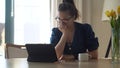 exhausted stressed leader Woman in glasses Chatting Laptop Living Room. Writing Searching Using IT. Tired Buisenes Lady Royalty Free Stock Photo
