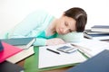 Exhausted student sleeping while studying