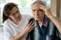 Exhausted tired asian senior woman touching head with her hands, ill elderly has vertigo,dizziness,sick old people suffering from