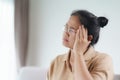 Exhausted tired depressed stressed thoughtful mature senior woman suffering from headaches, Brain diseases, mental problems, Royalty Free Stock Photo