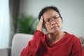 Exhausted tired depressed stressed thoughtful mature senior woman suffering from headaches, Brain diseases, mental problems, Royalty Free Stock Photo