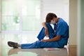 Exhausted tired doctor or nurse. Virus outbreak Royalty Free Stock Photo