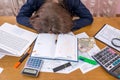 Exhausted woman getting ready for tax day Royalty Free Stock Photo