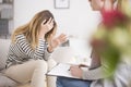 Exhausted woman at psychology clinic