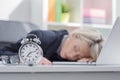 Exhausted woman sleeping in front of computer Royalty Free Stock Photo