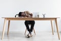 Exhausted young black man sleeping on desk near laptop pc, overworking, feeling tired, taking nap at office, copy space Royalty Free Stock Photo