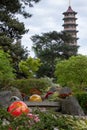 Exhibit entitled `Niijima Floats` by glass artist Dale Chihuly at Kew Gardens, London UK. Pagoda in background.