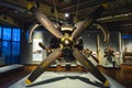 Large aircraft engine with four-blade propeller displayed at German Museum of Technology in Berlin, among aviation exhibits. Royalty Free Stock Photo
