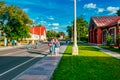 Exhibition Of Achievements Of The National Economy. On the alleys of the Park on a warm summer evening. Citizens walk in the rays