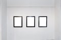 Exhibition gallery interior with empty frames on wall Royalty Free Stock Photo