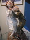 Soldier and bride dolls who dance. Exhibition of handmade dolls. Royalty Free Stock Photo