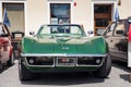 Exhibition of old cars. Interior of an old car. Old design in cars. Beautiful green old Corvette Convertible, front view. Oswiecim