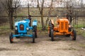 Exhibition of old and modern tractors in the museum of tractor history in Russia.Russian industrial tractors