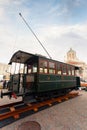 Exhibition of old vintage trams on the street in Brussels near the Church of St. James, Belgium.