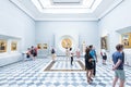 Exhibition room with visitors in Uffizi gallery in Florence, Italy