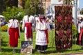 Exhibition of Ukrainian traditional clothes and rugs, true authentic ancient shirts, belts, skirt and trousers, carpet