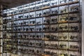 Exhibition on the wall of old sewing machines. Royalty Free Stock Photo