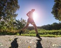 Exigent physical training. The athlete runs fast through alley