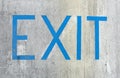 Exit on concrete wall