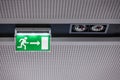 Exit sign on the ceiling Royalty Free Stock Photo