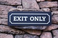 Exit Sign On Stone Wall Royalty Free Stock Photo
