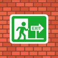 Exit sign on the wall. Royalty Free Stock Photo