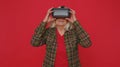 Woman using virtual reality futuristic technology VR headset helmet to play simulation 3D video game Royalty Free Stock Photo
