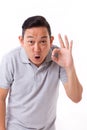 Exited man giving ok hand sign gesture Royalty Free Stock Photo