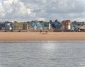 Exmouth, devon: playing on the beach. clouds