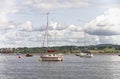 Exmouth, devon: sailing boats anchored at low tide. clouds