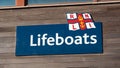 Exmouth, UK - August 03 2020: RNLI Lifeboats sign on the Lifeboat station on the seafront