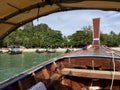 Exotic beach view from a water taxi longtail boat in Railay Beach, Krabi