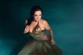 Exotic Belly Dancer in Gold Costume Royalty Free Stock Photo