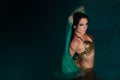 Exotic Belly Dancer in Gold Costume Royalty Free Stock Photo