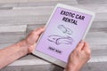Exotic car rental concept on a tablet Royalty Free Stock Photo