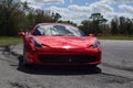 Red Ferrari with mirror paint on a track in Florida Royalty Free Stock Photo