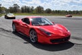 Red Ferrari with mirror paint on a track in Florida Royalty Free Stock Photo