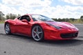 Red Ferrari with mirror paint on a track in Florida Royalty Free Stock Photo